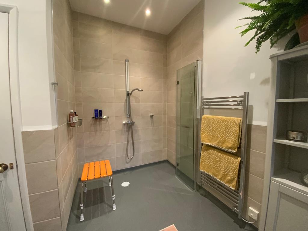 Luxury accessible wet room design in a domestic setting