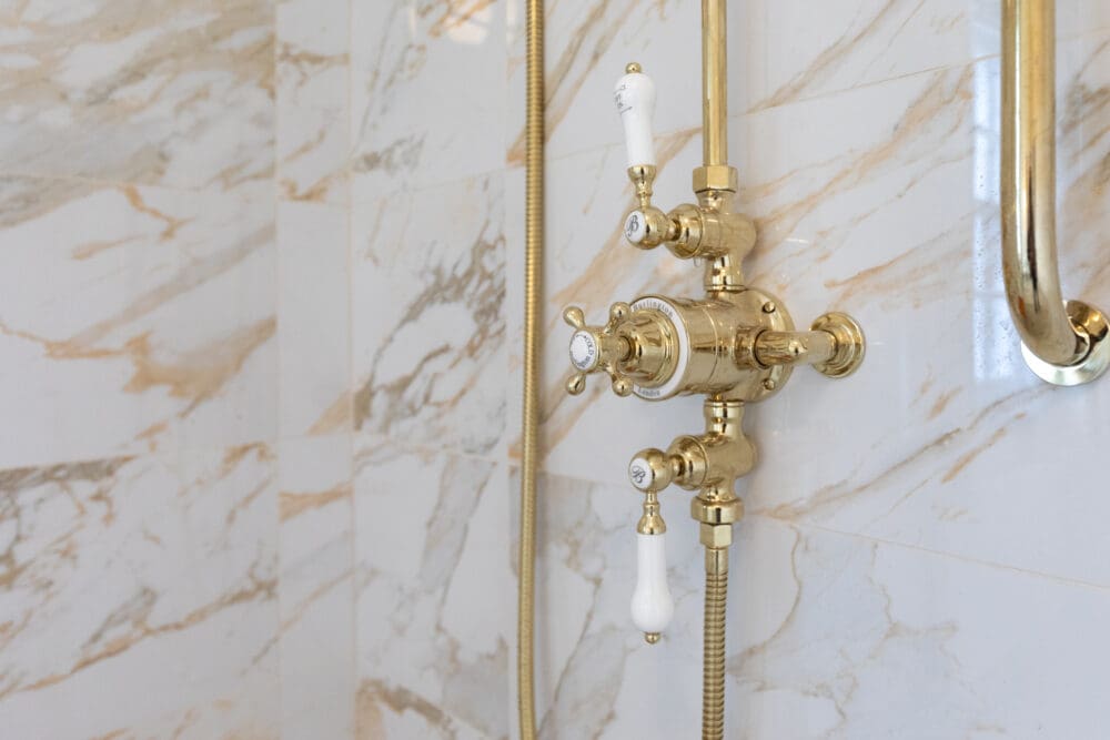 Rose Gold dual shower valve with white handles