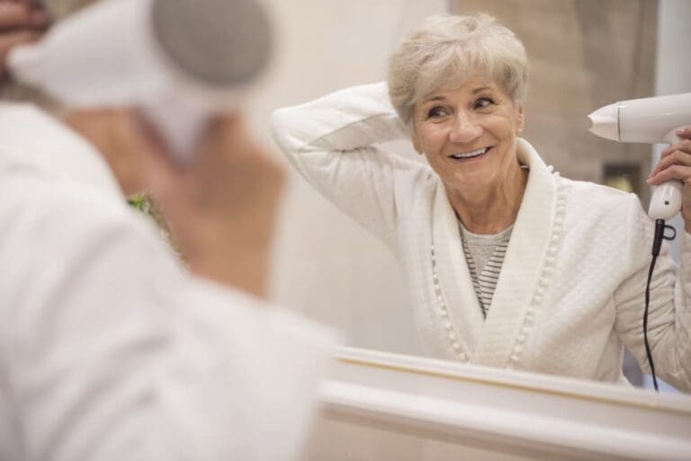 Elderly Lady Drying Hair